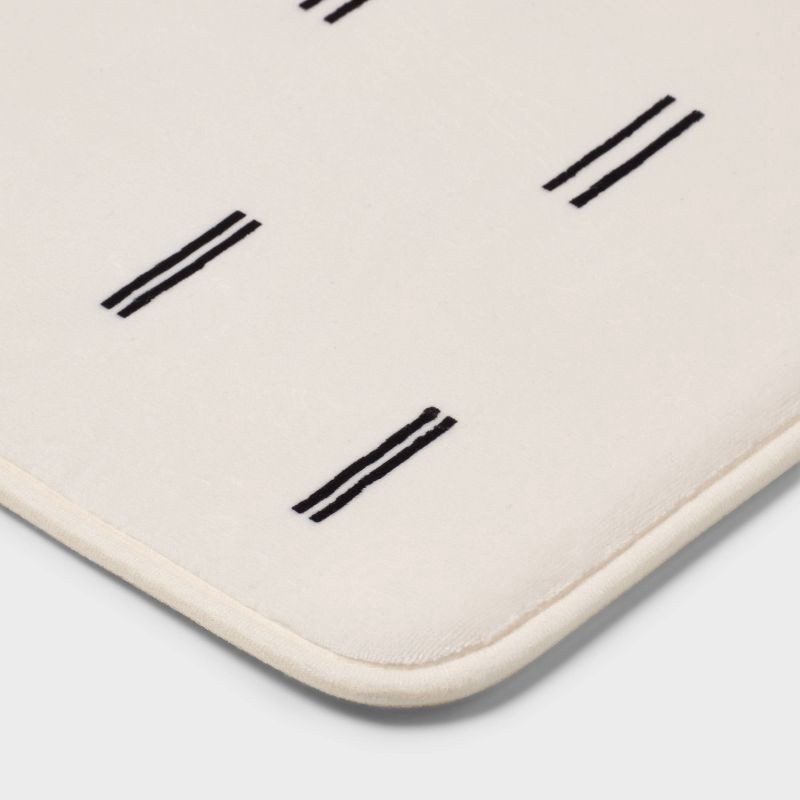 slide 3 of 4, 17"x24" Double Dash Flannel Cushion Bath Rug - Room Essentials™, 1 ct