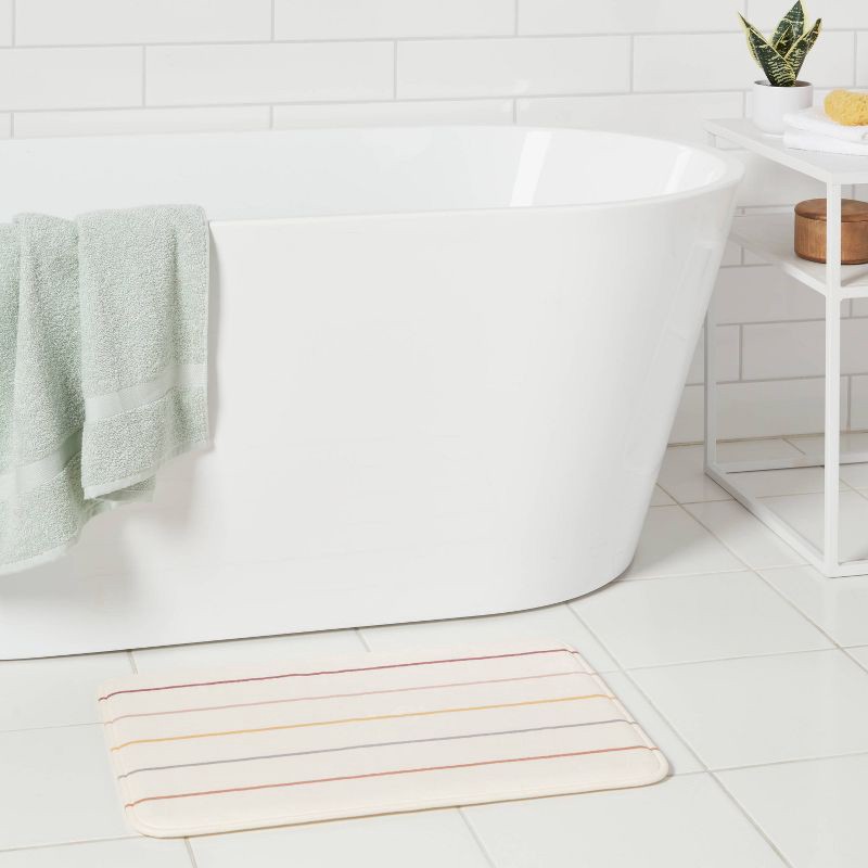 slide 2 of 4, 17"x24" Multi Striped Flannel Cushion Bath Rug - Room Essentials™, 1 ct