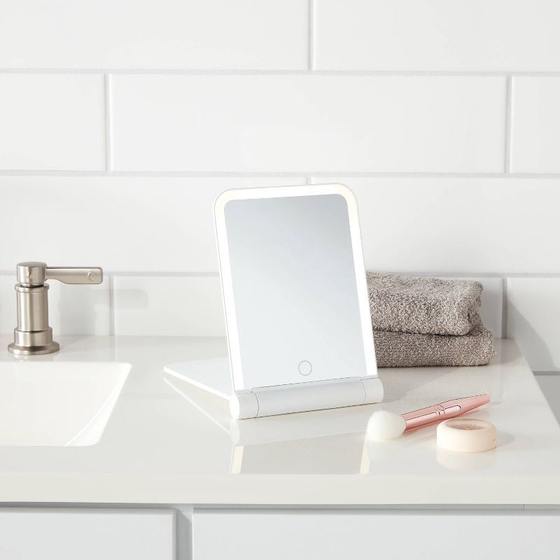 slide 2 of 4, Lighted Travel Mirror with Cover - Room Essentials™: Portable, Rectangular, 1X Magnification, LED Illumination, 1 ct