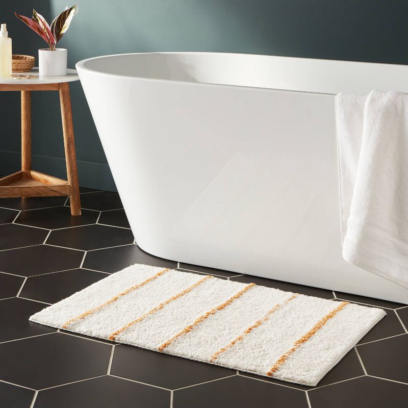 slide 2 of 4, 20"x30" Modern Tufted Stripe Bath Rug Yellow/Cream - Threshold™, 1 ct