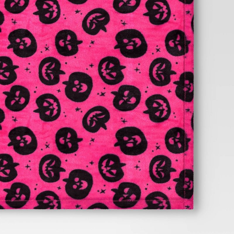 slide 4 of 5, Pumpkin Printed Plush Halloween Throw Blanket Pink - Hyde & EEK! Boutique™: Cozy Recycled Polyester, Knitted, 50x60", 1 ct