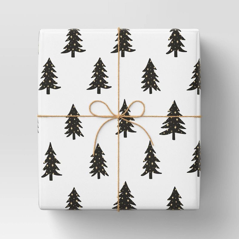 slide 2 of 3, 20 sq ft Trees with Gold Metallic Snow Christmas Gift Wrap White - Wondershop™: Black Tree Pattern, FSC Certified Paper, 20 sq ft