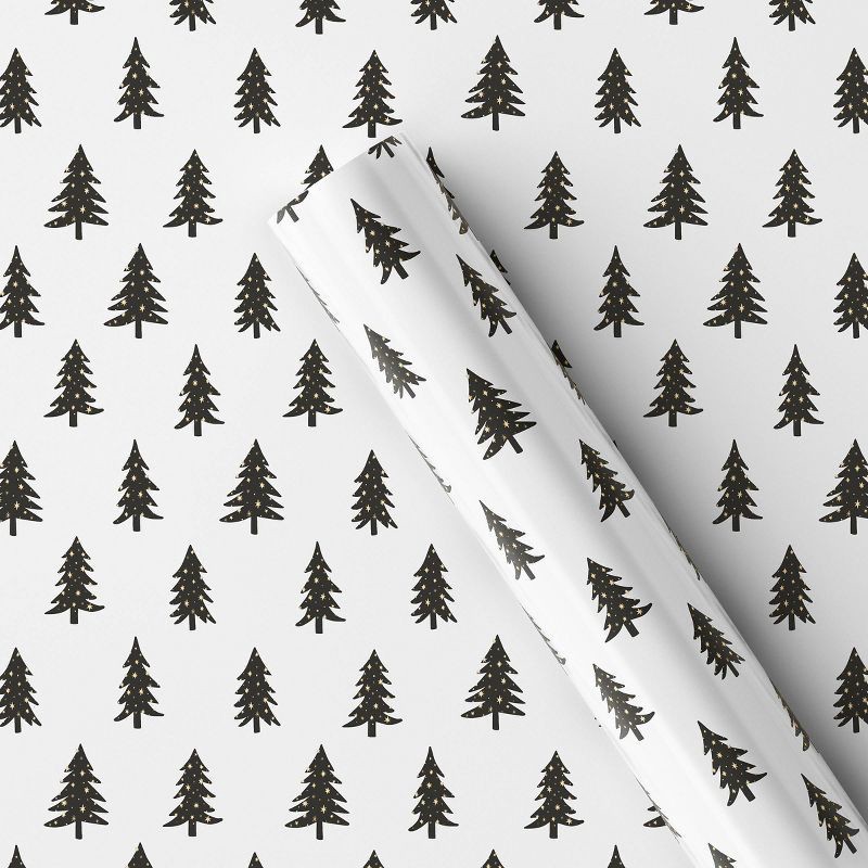 slide 1 of 3, 20 sq ft Trees with Gold Metallic Snow Christmas Gift Wrap White - Wondershop™: Black Tree Pattern, FSC Certified Paper, 20 sq ft