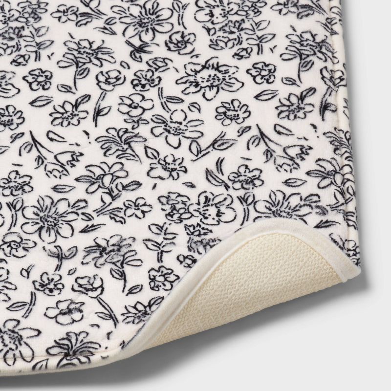 slide 4 of 4, 17"x24" Floral Flannel Cushion Bath Rug Black/White - Room Essentials™, 1 ct