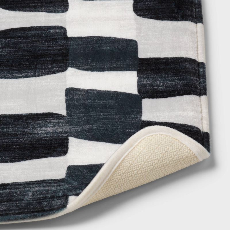 slide 4 of 4, 17"x24" Watercolor Blocks Flannel Cushion Bath Rug - Room Essentials™, 1 ct