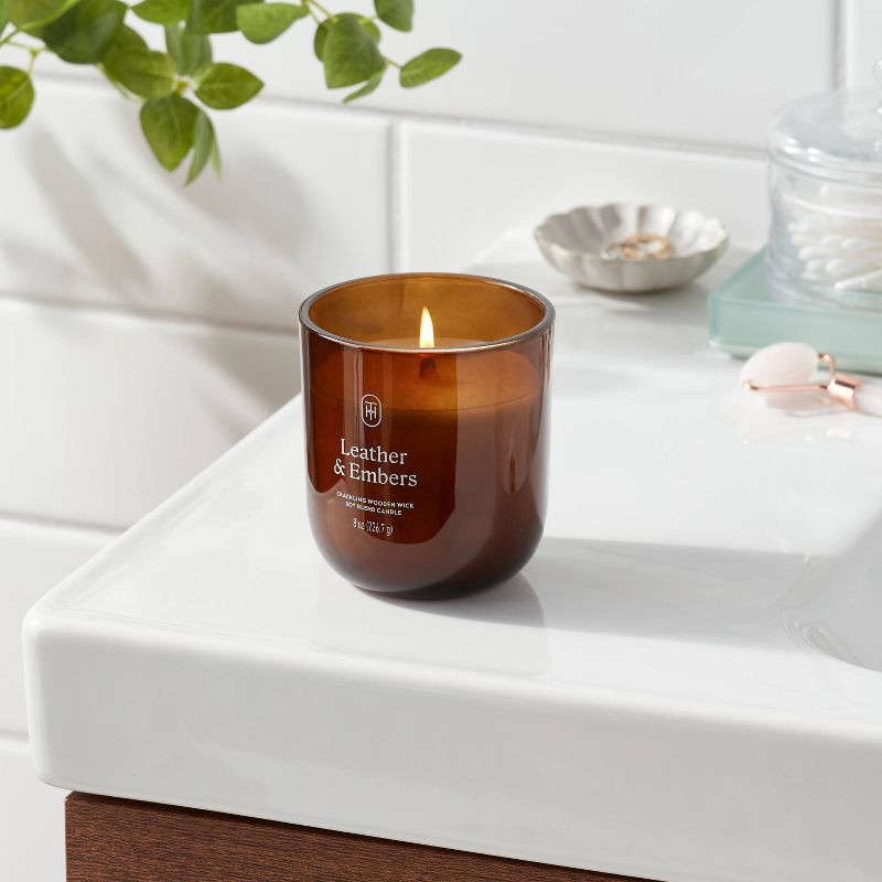 slide 2 of 3, Amber Glass Wooden Wick Leather and Embers Jar Candle 8oz - Threshold™, 8 oz