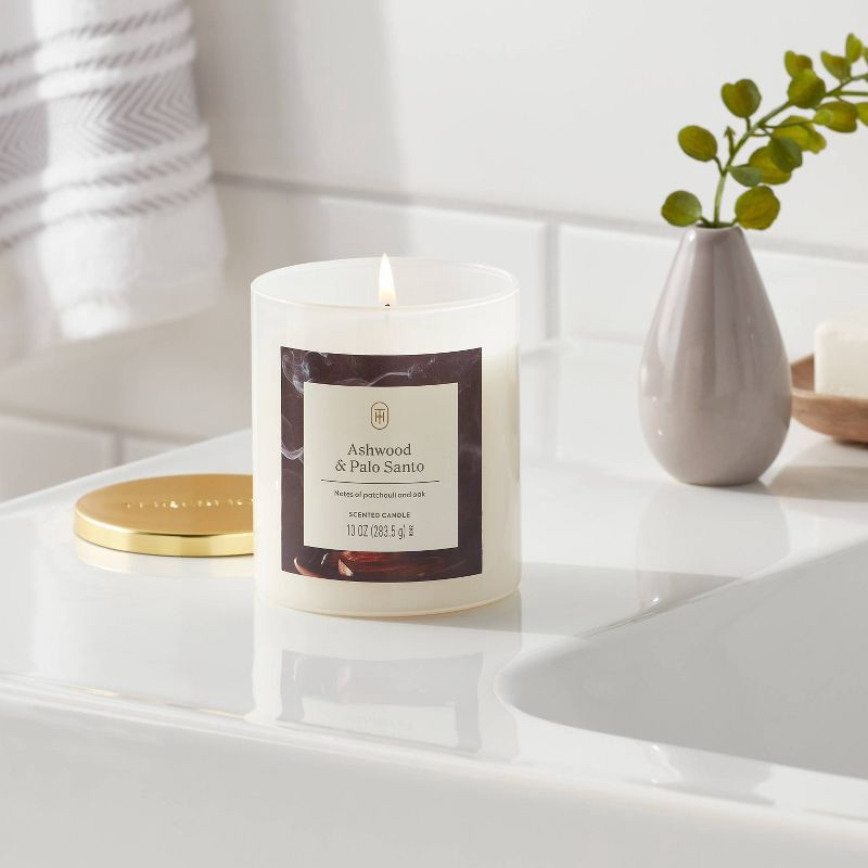 slide 2 of 3, Lidded Glass Jar Candle Ashwood and Palo Santo 10oz - Threshold™, 10 oz