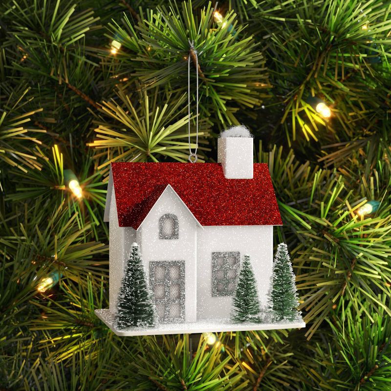 slide 2 of 3, Glittered House with Red Roof and Bottle Brush Trees Christmas Tree Ornament White - Wondershop™: Indoor Use, 3.5" Height, 1 ct