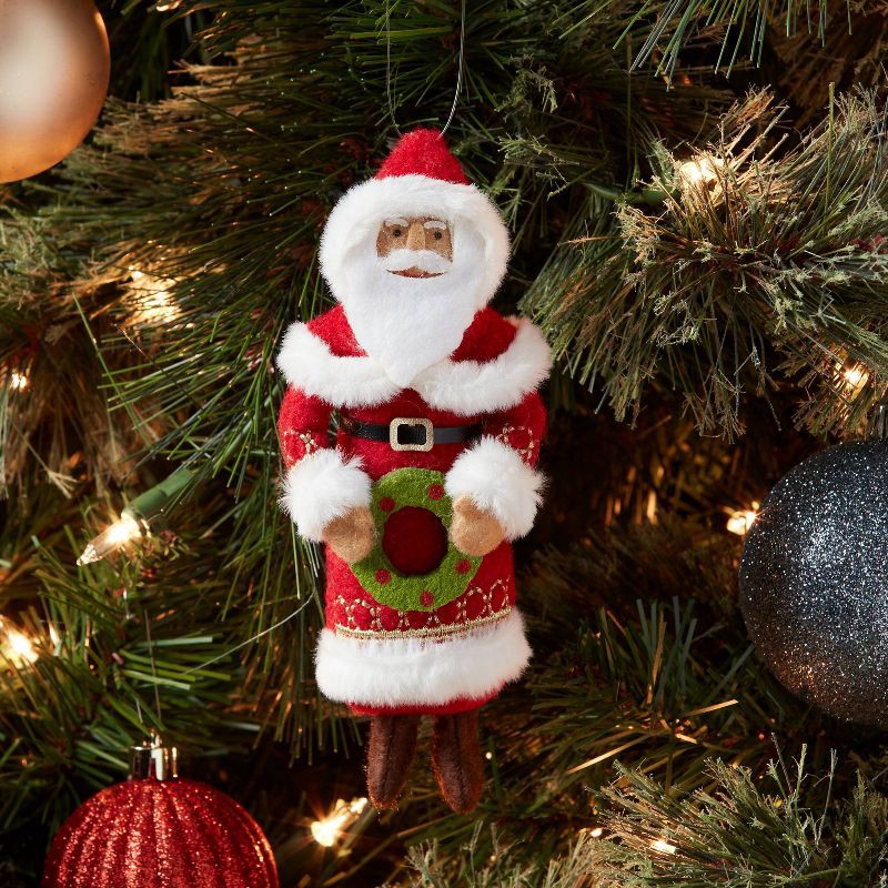 slide 2 of 3, Fabric Santa Holding Wreath Christmas Tree Ornament - Wondershop™, 1 ct