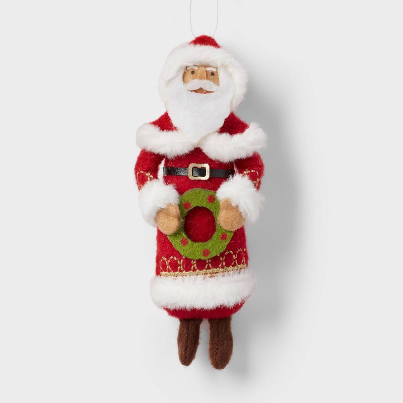 slide 1 of 3, Fabric Santa Holding Wreath Christmas Tree Ornament - Wondershop™, 1 ct