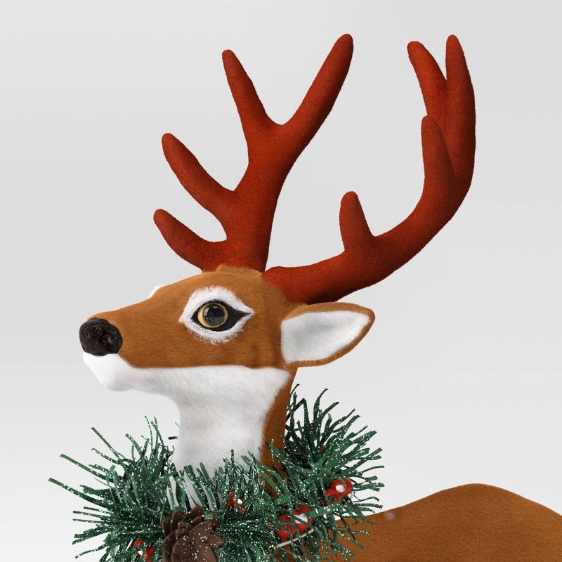 slide 3 of 3, Flocked Standing Deer with Faux Greenery Christmas Animal Figurine - Wondershop™ Brown, 1 ct