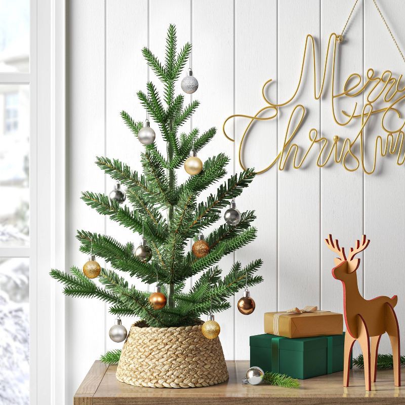 slide 2 of 4, 24" Mini Artificial Christmas Tree with Black Base - Wondershop™: Tabletop Green Faux Floral, Indoor Decor, 1 ct