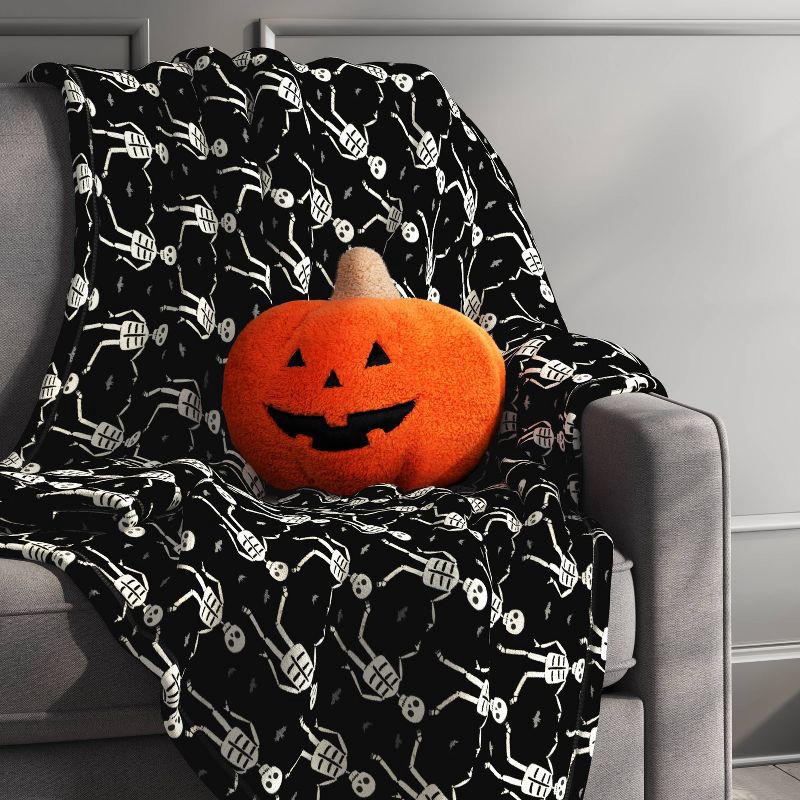 slide 2 of 4, Halloween Printed Skeleton Throw Blanket Black/Ivory - Hyde & EEK! Boutique™: Recycled Polyester, Knitted, 50x60", Machine Washable, 1 ct