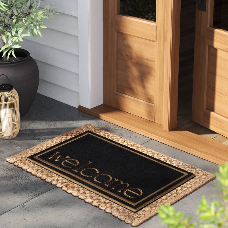 slide 2 of 4, 1'6"x2'6" 'Welcome' Embossed Doormat Black - Threshold™, 1 ct