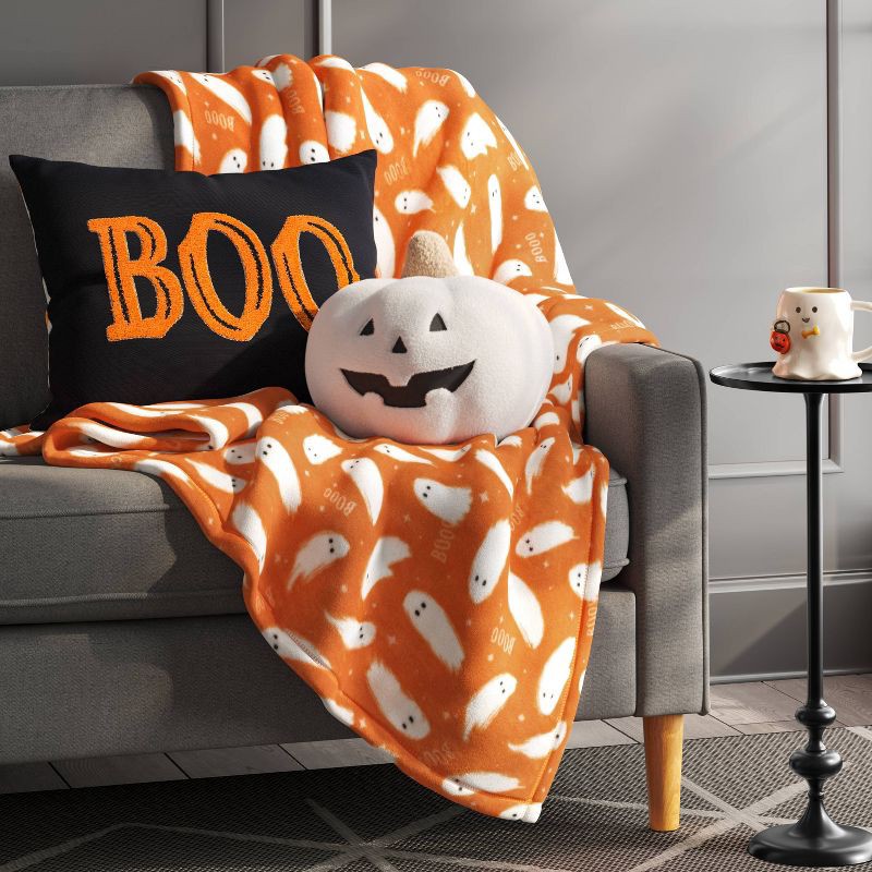 slide 2 of 5, Ghost Printed Plush Halloween Throw Blanket Orange/Ivory - Hyde & EEK! Boutique™: Lightweight, Knitted, Recycled Polyester, 50x60", 1 ct