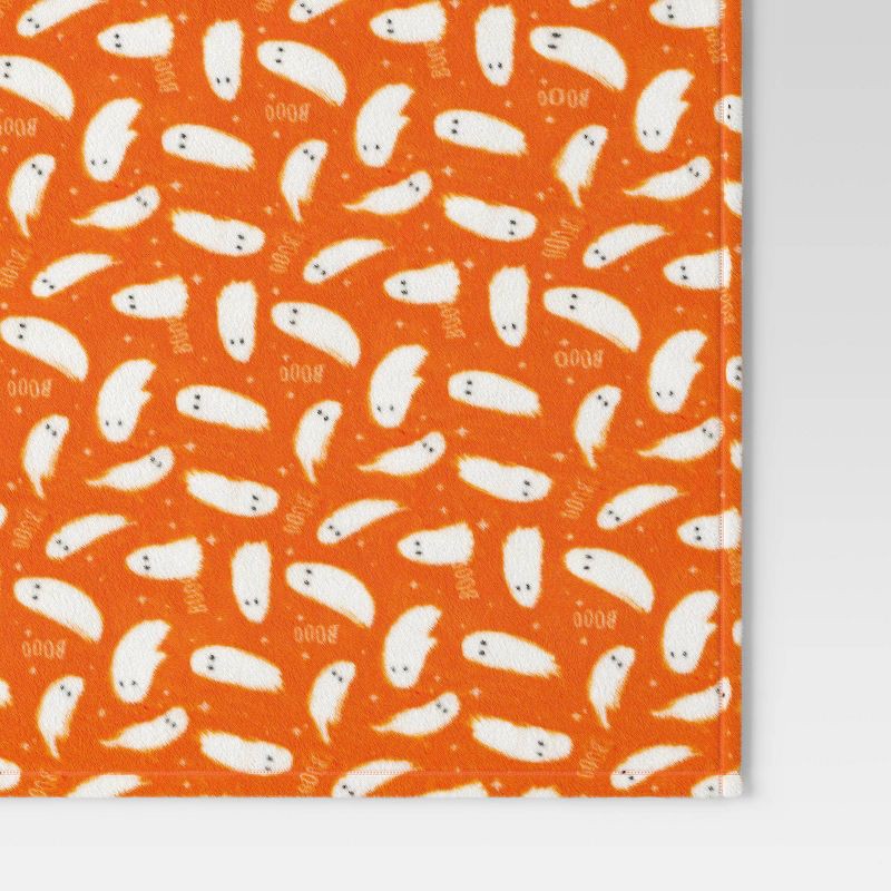 slide 4 of 5, Ghost Printed Plush Halloween Throw Blanket Orange/Ivory - Hyde & EEK! Boutique™: Lightweight, Knitted, Recycled Polyester, 50x60", 1 ct