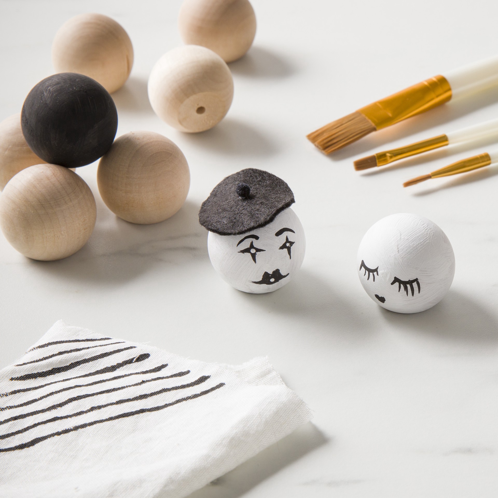 slide 2 of 2, 1.5" Wood Doll Heads, 7ct. By Make Market, 7 ct