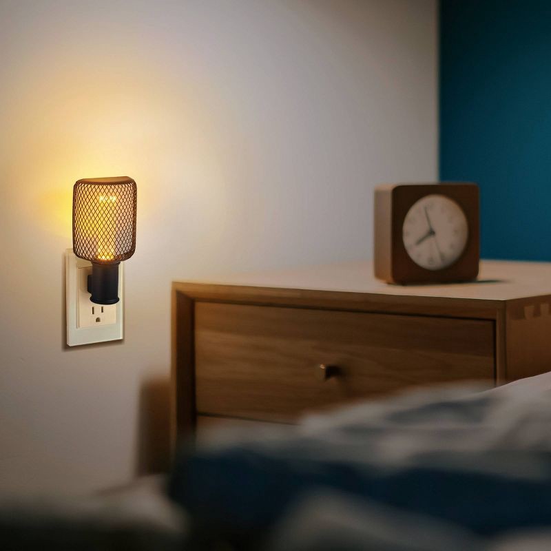 slide 5 of 9, Globe Electric Auto On/Off Metal Cage Night Light: LED Wall Plug Nightlight for Kids', Black, No Assembly Required, 1 ct