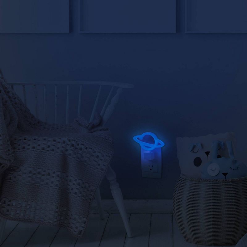 slide 6 of 8, Globe Electric Auto On/Off Neon Blue Planet Night Light: LED Plug-In for Kids' & Toddlers, Novelty Wall Nightlight, 1 ct