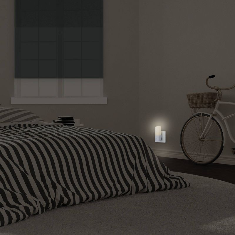 slide 6 of 8, Globe Electric LED Auto On/Off Cylinder Night Light 3000K 5 Lumens: Wall Plug-In, Kids' Novelty, White, No Assembly Required, 1 ct