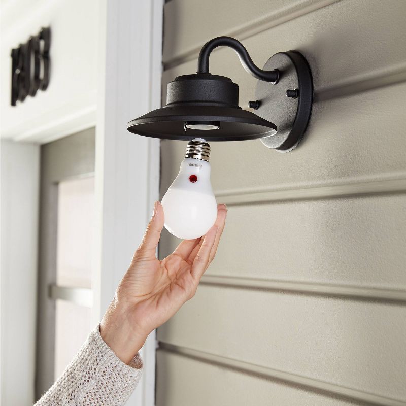 slide 3 of 6, Philips LED Dusk to Dawn 60W A19: Energy Star Certified Outdoor Light Bulb, 800 Lumens, 2700K, E26 Base, 13.7-Year Life, 1 ct