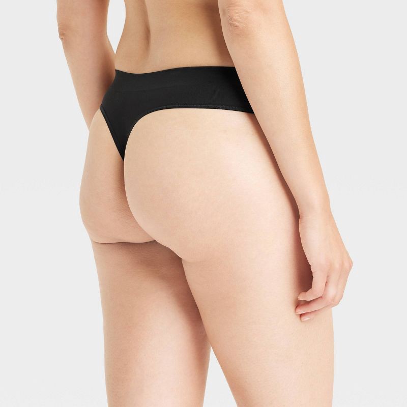 slide 2 of 5, Women's Seamless Thong Underwear - Auden™ Black M: Lightweight Nylon Spandex Blend, Mid Rise, Pull-On, 1 ct