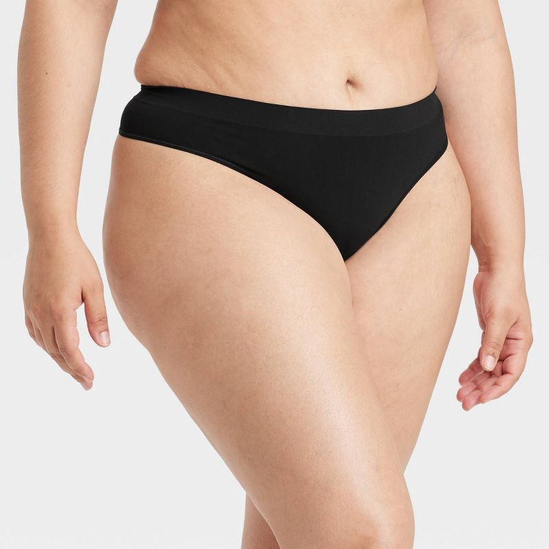 slide 4 of 5, Women's Seamless Thong Underwear - Auden™ Black L: Lightweight Nylon-Spandex, Mid Rise, Pull-On, Machine Washable, Opaque, 1 ct