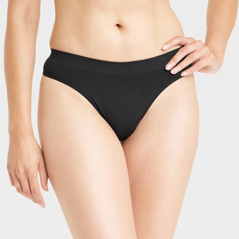 slide 1 of 5, Women's Seamless Thong Underwear - Auden™ Black L: Lightweight Nylon-Spandex, Mid Rise, Pull-On, Machine Washable, Opaque, 1 ct