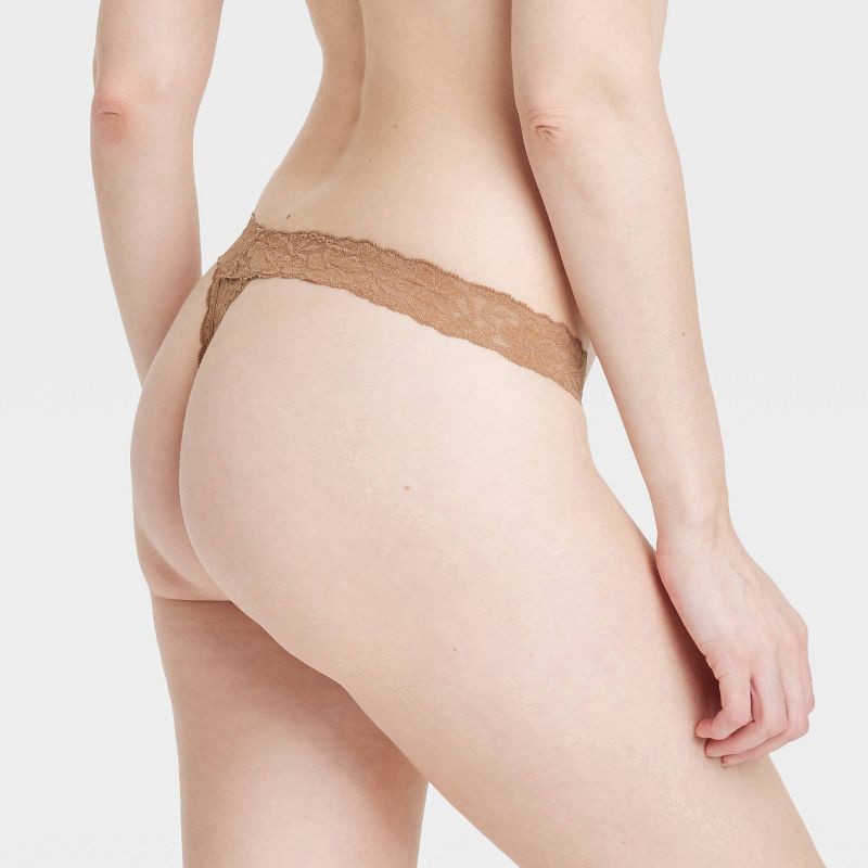 slide 2 of 7, Women's Allover Lace Thong Underwear - Auden™ Camel L: Nylon Spandex Blend, Mid Rise, Pull-On, 1 ct