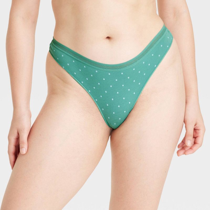 slide 4 of 5, Women's 6pk Cotton Stretch Thong Underwear - Auden™ Assorted Color XS: Low Rise, Solid & Polka Dots, Knit Jersey, Machine Washable, 6 ct