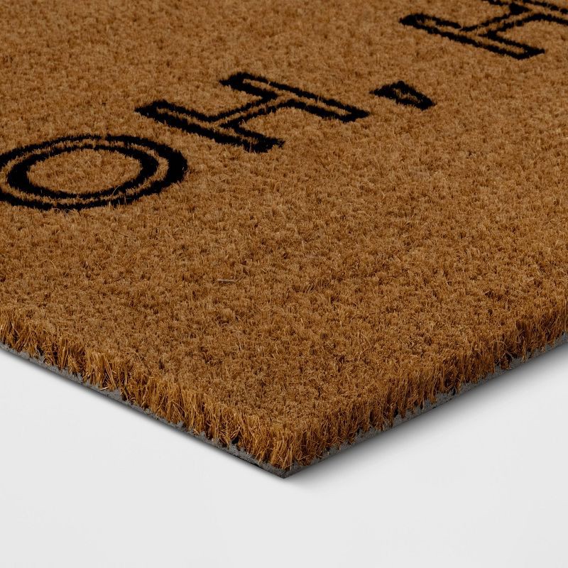 slide 3 of 4, 1'4"x2'4" Oh Hello Rectangular Outdoor Doormat Black - Room Essentials™, 1 ct