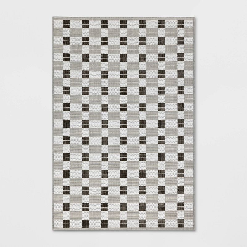 slide 1 of 4, 3'11"x5'5" Checkered Rectangular Indoor Outdoor Area Rug Black - Room Essentials™, 1 ct