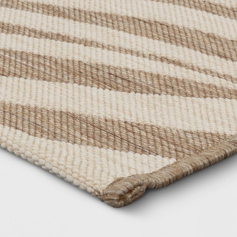 slide 3 of 4, 5'x7' Wavy Lines Outdoor Area Rug Beige/Natural Brown - Threshold™, 1 ct