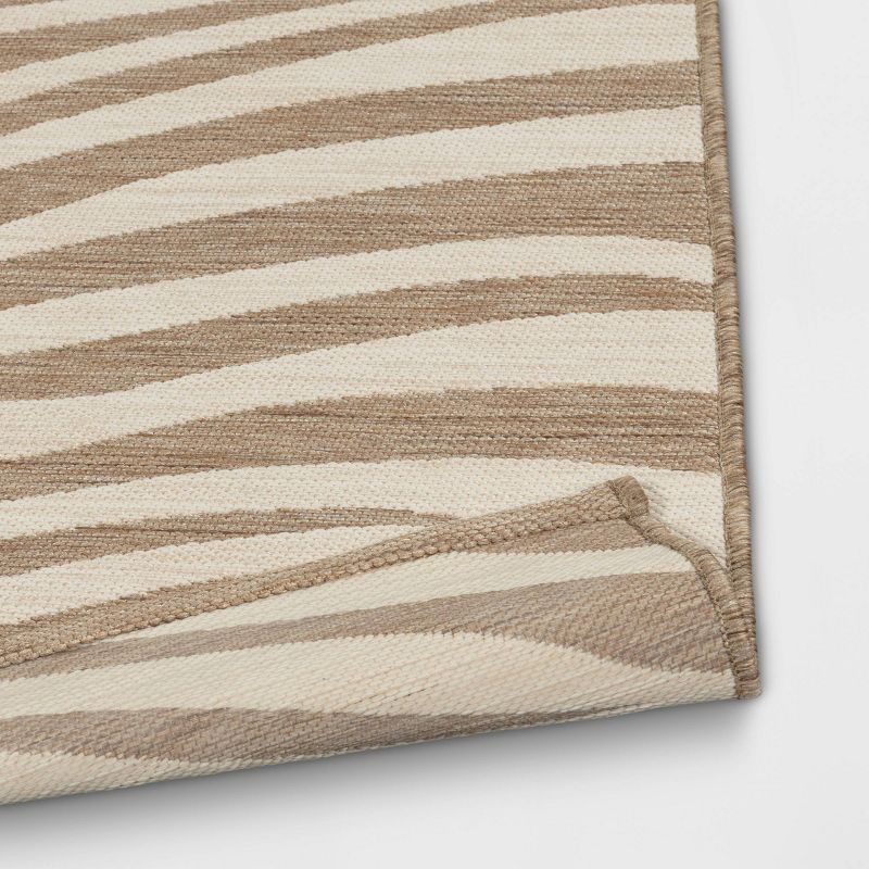 slide 4 of 4, 5'x7' Wavy Lines Outdoor Area Rug Beige/Natural Brown - Threshold™, 1 ct