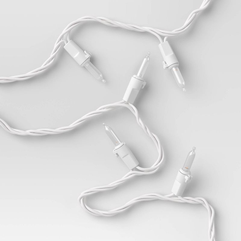 slide 1 of 4, 100ct LED Indoor Outdoor Miniature String Lights Clear Bulbs with White Wire - Threshold™, 100 ct