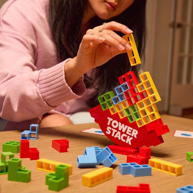 slide 5 of 8, Tower Stack Game by What Do You Meme?: Classic Creative Thinking Play for 2+ Players, 1 ct