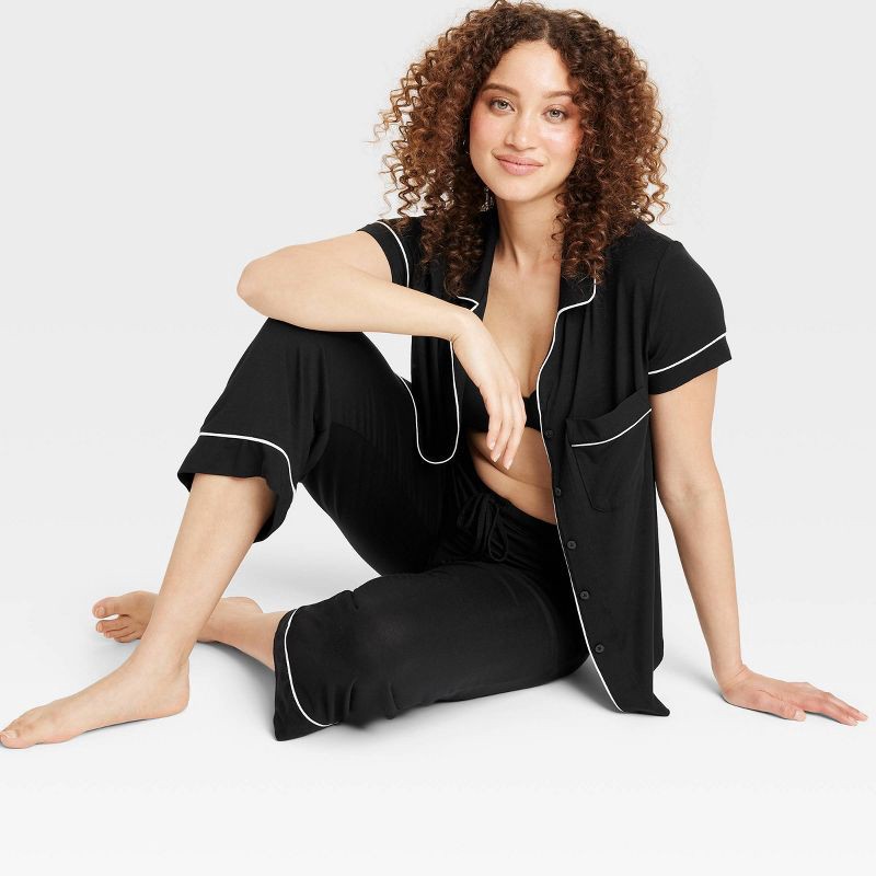 slide 2 of 5, Women's Cloud Knit Modal Short Sleeve Notch Collar Top and Cropped Pants Pajama Set - Auden™ Black L: Modal Spandex Blend, 1 ct
