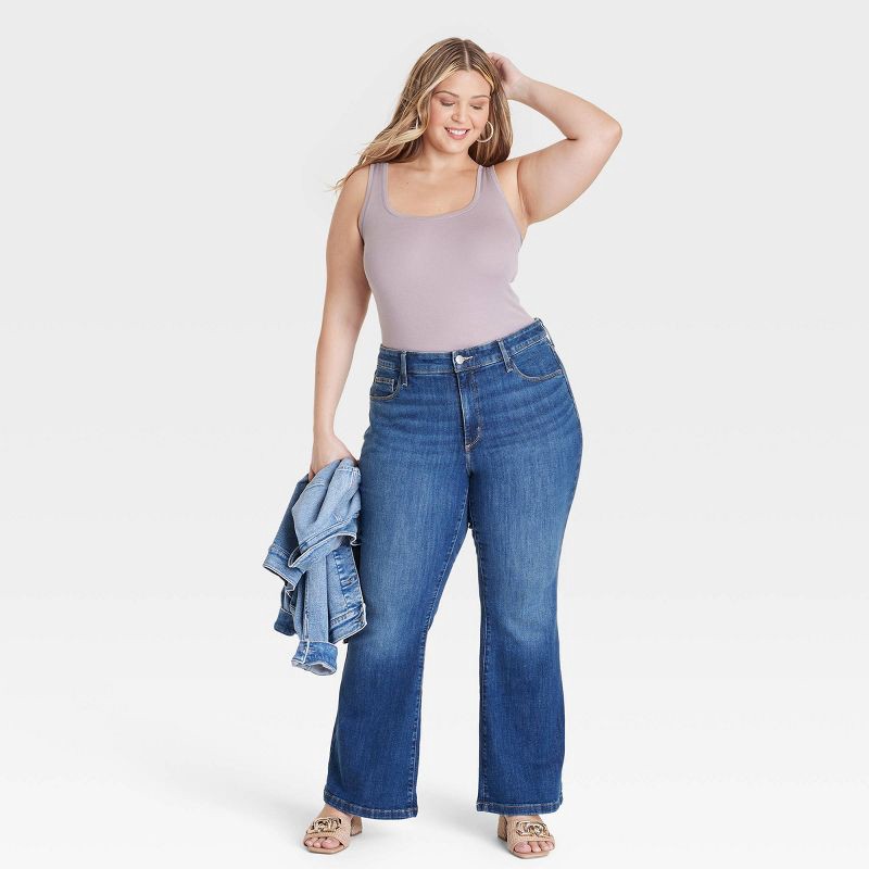 slide 3 of 3, Women's High-Rise Relaxed Flare Jeans - Ava & Viv™ Dark Wash 20: Plus Size, Midweight Denim, Stretch Fabric, 1 ct