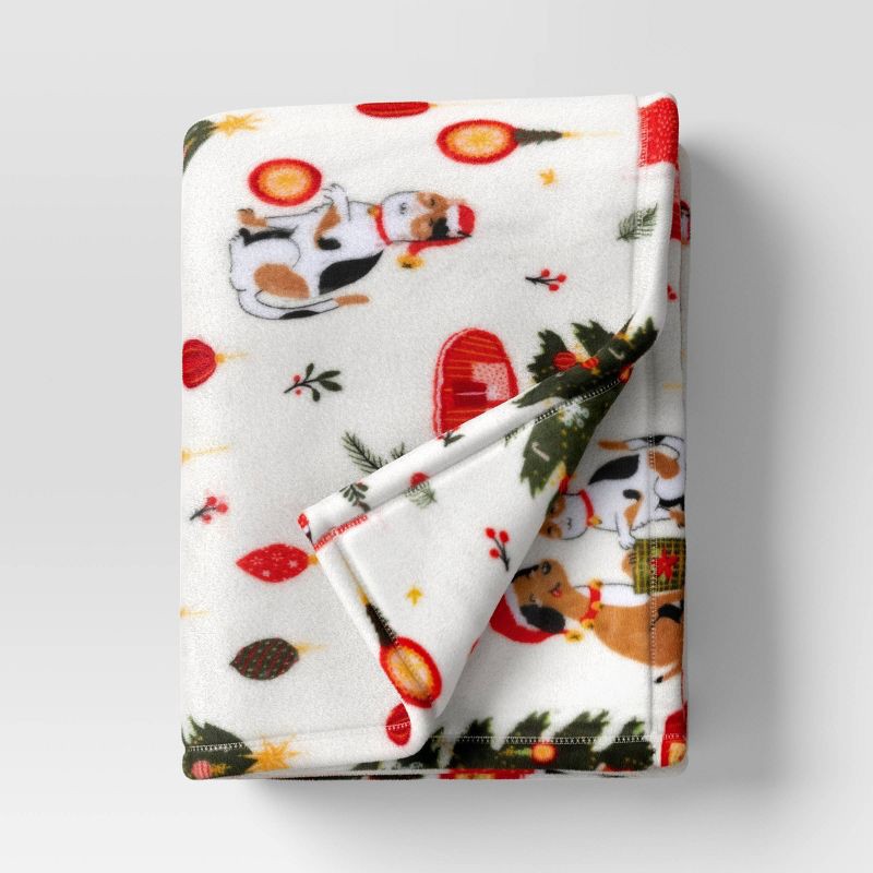 slide 1 of 5, Christmas Puppy & Kitty Printed Plush Throw Blanket Ivory - Wondershop™, 1 ct