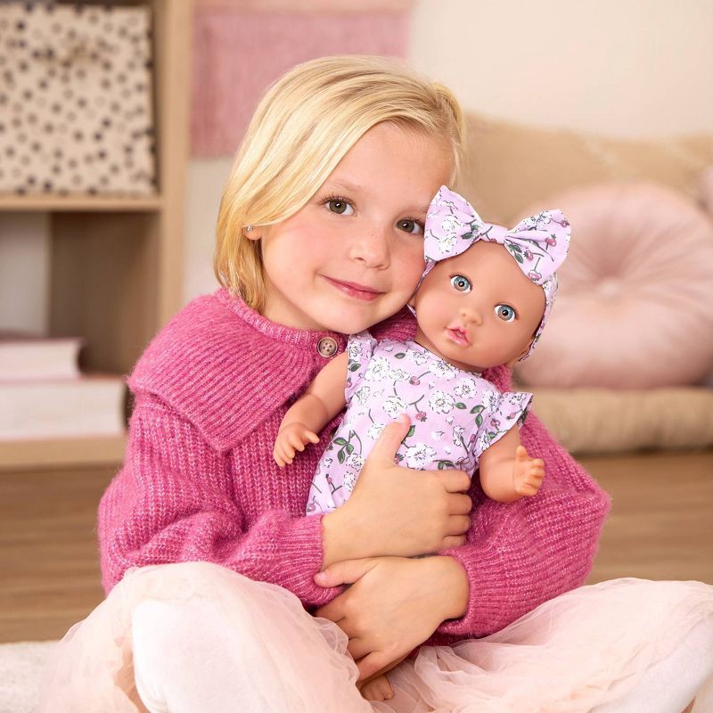 slide 2 of 10, LullaBaby 14" Baby Doll with Floral Outfit & Pacifier - Blue Eyes: BPA-Free, Plastic & Polyester, Girl Theme, 1 ct