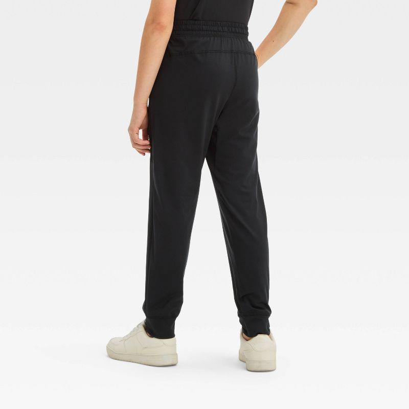slide 2 of 3, Boys' Soft Stretch Jogger Pants - All In Motion™ Black Onyx XL: Recycled Polyester, Spandex, Moisture Wicking, Quick Drying, 1 ct