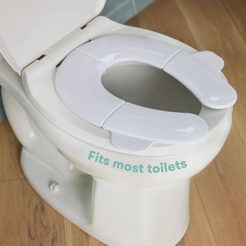 slide 2 of 7, Frida Baby Fold n Go Potty Toilet Training Seat - White, 1 ct