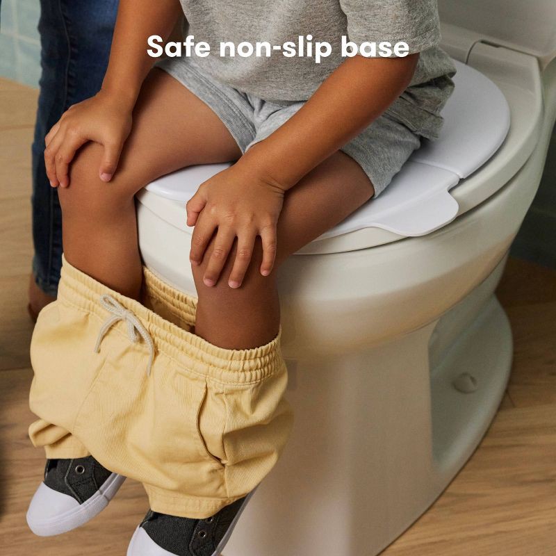 slide 5 of 7, Frida Baby Fold n Go Potty Toilet Training Seat - White, 1 ct