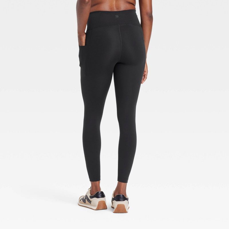 slide 2 of 6, Women's Dynamic Flex High-Rise Pocketed 7/8 Leggings - All In Motion™ Black XS, 1 ct