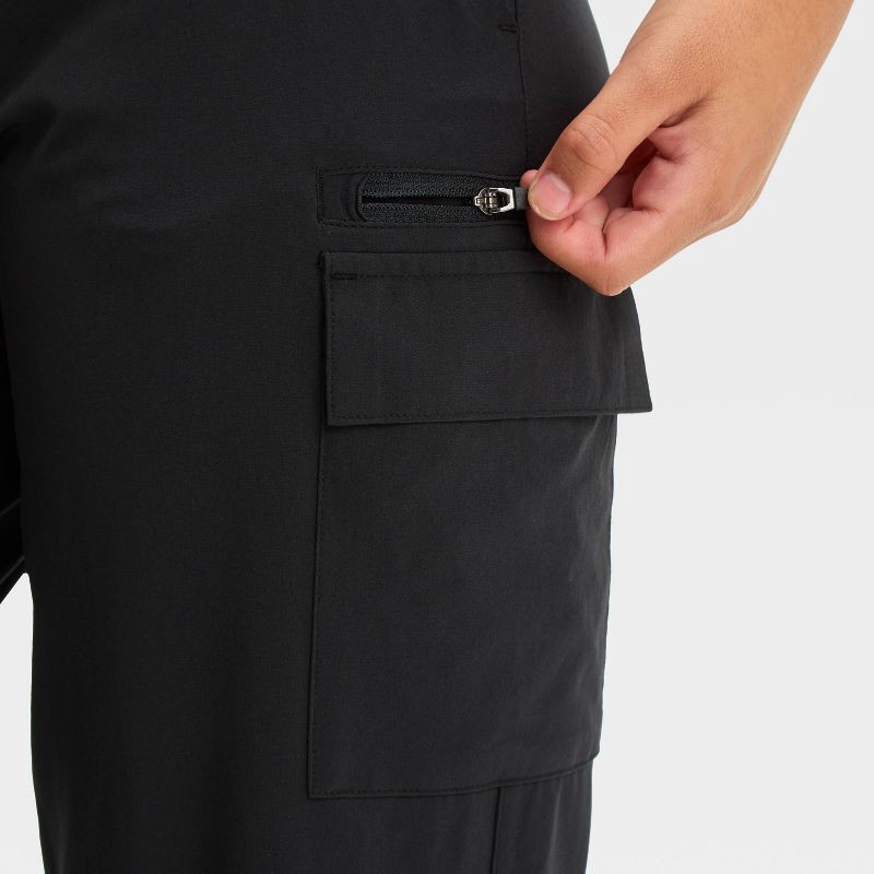 slide 3 of 3, Girls' Woven Cargo Jogger Pants - All In Motion™ Black L: Midweight, Moisture Wicking, Quick Drying, 1 ct