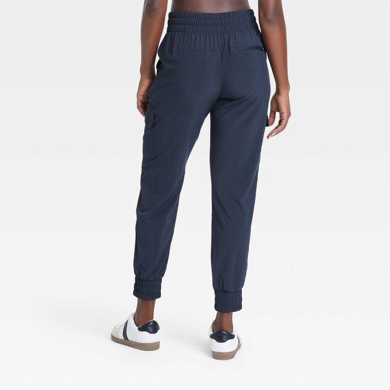 slide 2 of 5, Women's Active Light Mid-Rise Cargo Jogger Pants - All In Motion™ Navy Blue XL: Moisture Wicking, Quick Drying, 1 ct