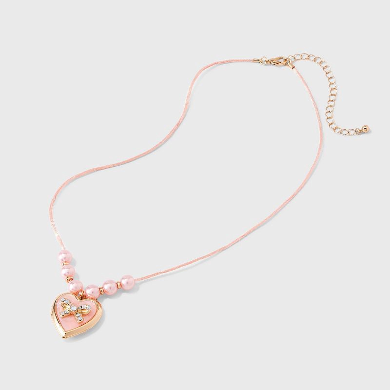 slide 2 of 4, Girls' Pink Bow Locket Necklace - Cat & Jack™ Pink, 1 ct