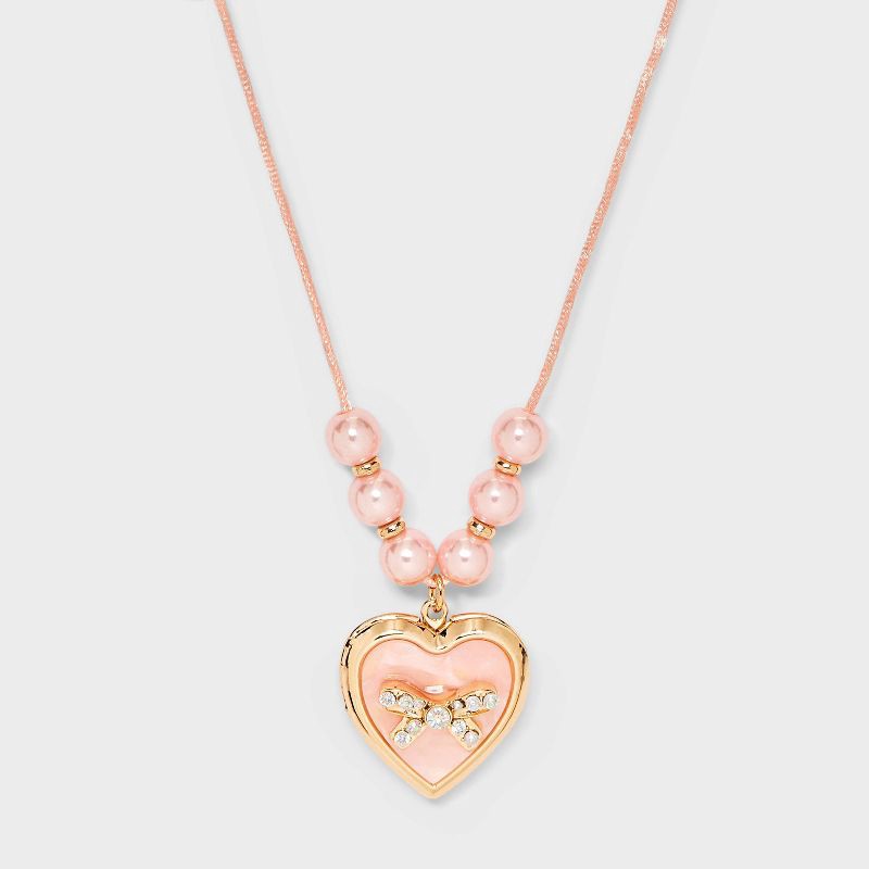 slide 1 of 4, Girls' Pink Bow Locket Necklace - Cat & Jack™ Pink, 1 ct