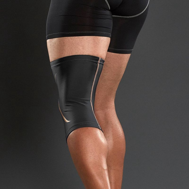 slide 3 of 5, Tommie Copper Sport Compression Knee Support Sleeve - L/XL: Joint Support, Polyester, 1 ct