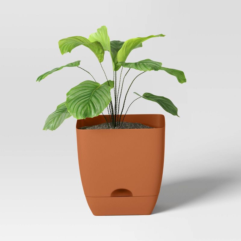 slide 3 of 4, Square Self-Watering Plastic Indoor Outdoor Planter Pot Orange 10"x10" - Room Essentials™, 1 ct